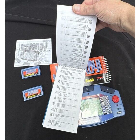 1995 Jeopardy Handheld Game Tiger Electronics Tested 2 Cartridge & Books -A75 - Picture 8 of 9